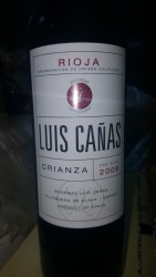Luis Cañas Reserva is a red wine produced by Luis Cañas, in the D.O Rioja.<br /><br />The winery Luis Cañas is a family run business located in Villabuena (La Rioja Alavesa). The family has been producing wines since the 20th century.<br /><br />Luis Cañas Reserva is produced from the variety Tempranillo (95%) and Graciano (5%).<br /><br />The grapes originate from old vines, aged between 50-60 years old, low yielding vines.<br /><br />The harvest is performed using small 15kg capacity boxes, once at the winery the grapes undergo a double selection process: bunches and grapes.<br /><br />For production, the fermentation process is completed in wooden vats, the malolactic fermentation is achieved through new French (70%) and American (30%) oak barrels.<br /><br />Luis Cañas Reserva is aged in the same barrels for 24 months. Finally, Luis Cañas Reserva is left to refine in the bottle for a further additional 36 months in bottle.<br /><br />Winery<br />Luis Cañas.<br />Grapes<br />Tempranillo, Graciano, . Rioja is arguably Spain's top wine region and is one of only two regions classified under the Denominación de Origen Calificada (DOCa) system. Its two most important red grapes are Tempranillo and Garnacha.<br /><br />Although red wines from Rioja are prized, Spanish wines generally offer great bang for the buck, allowing one to indulge in quality vino without breaking the bank!<br /><br />There are four categories of red wine in Rioja. The youngest of these is “Joven”. “Crianza” wines are required to age for a minimum of 2 years, with 6 months spent in oak barrels. The next level is “Reserva” in which the wine ages for a minimum of 3 years, with at least 1 year in oak barrels. Finally, the most mature wines are labeled “Gran Reserva”. These wines mature for minimum 2 years in oak barrels, followed by at least 3 years in the bottle.<br /><br />Typically younger wines will be lighter in body style, exhibit more fresh fruit characteristics and are suitable to drink while young. Older wines have more developed flavor profiles, earthy characteristics, and are better suited to aging.<br /><br />The medium body and high acidity in Spanish red wines from Rioja makes them excellent for pairing with a variety of foods. The approachable price points makes these wines of outstanding quality, readily available to enjoy sans guilt.